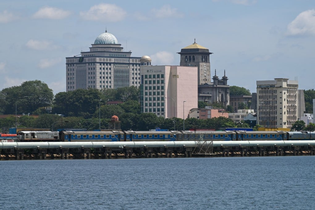 A Malaysian KTM train approaches the Woodlands land border checkpoint with Singapore last summer. Malaysian-government owned entity MyHSR Corp has called for proposals to develop and operate the Kuala Lumpur-Singapore High Speed Rail project via a public-private partnership model. Photo: AFP