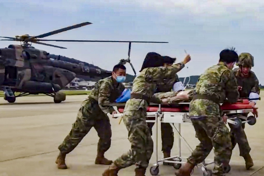 Chinese troops take part in an evacuation drill on an unidentified island off the east coast of Zhejiang province. Photo: CCTV