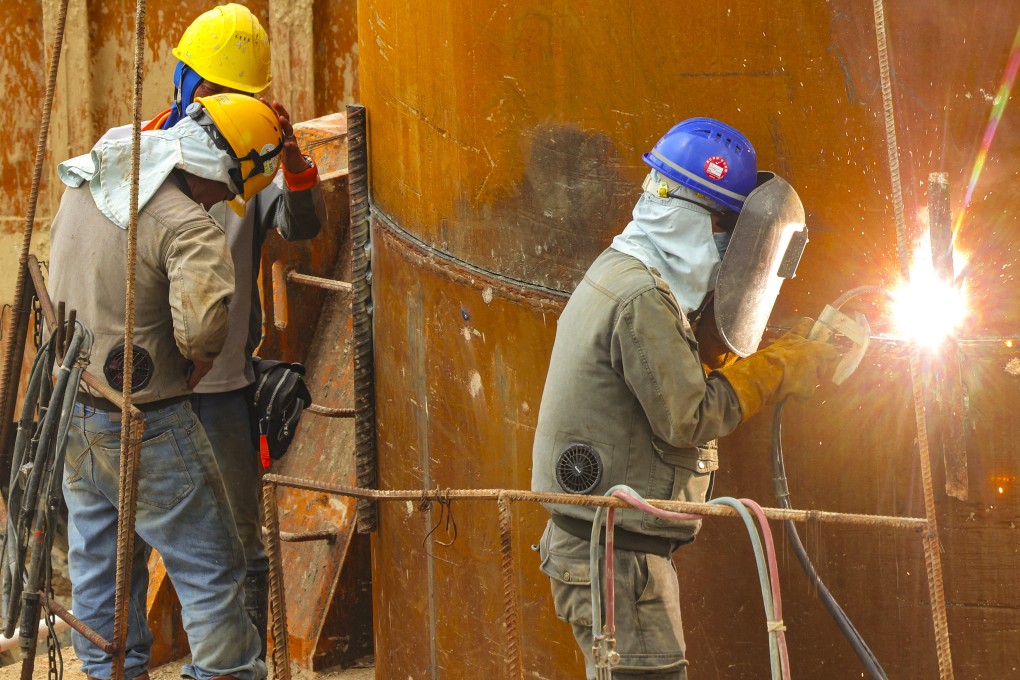 The first batch of construction workers to be brought in under a labour import scheme will arrive in Hong Kong during the fourth quarter, the city’s development minister says. Photo: Jelly Tse