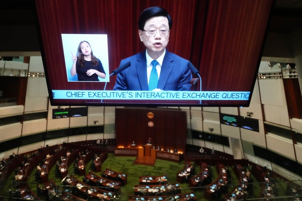 Hong Kong should establish itself as a training centre for international legal talent, Chief Executive John Lee (centre) says. Photo: Sam Tsang