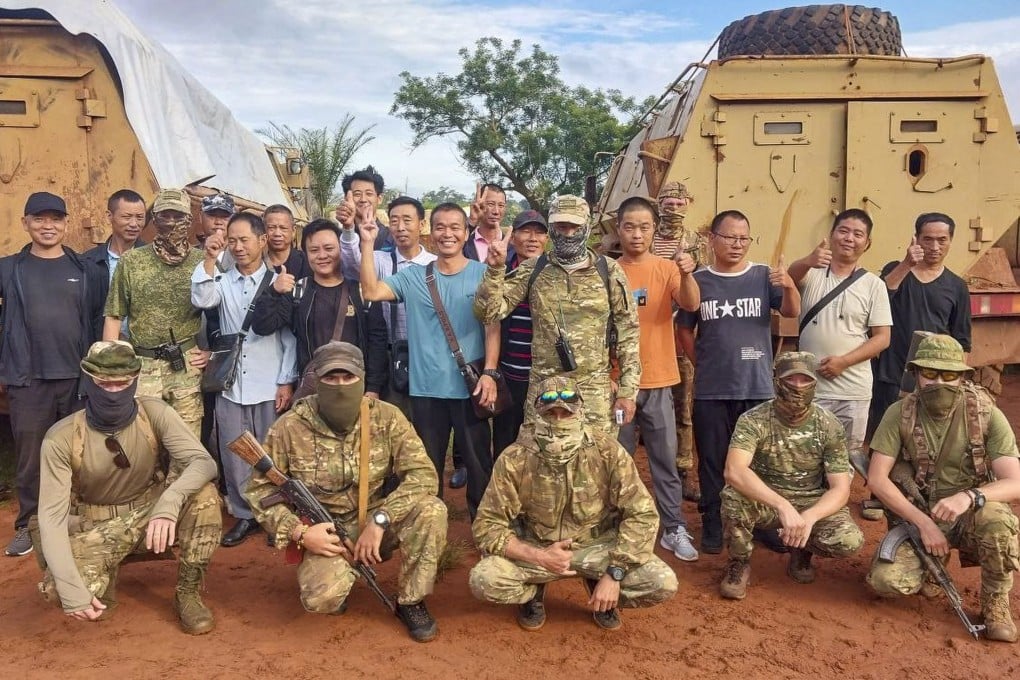 Wagner fighters posing with evacuated Chinese miners who were at a mine near Bambari in the Central African Republic. Photo: Wagner Group