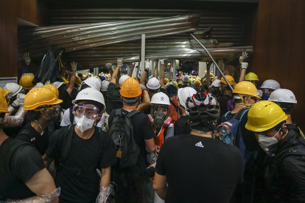 Protesters storm the Legislative Council on July 1, 2019. Photo: Winson Wong