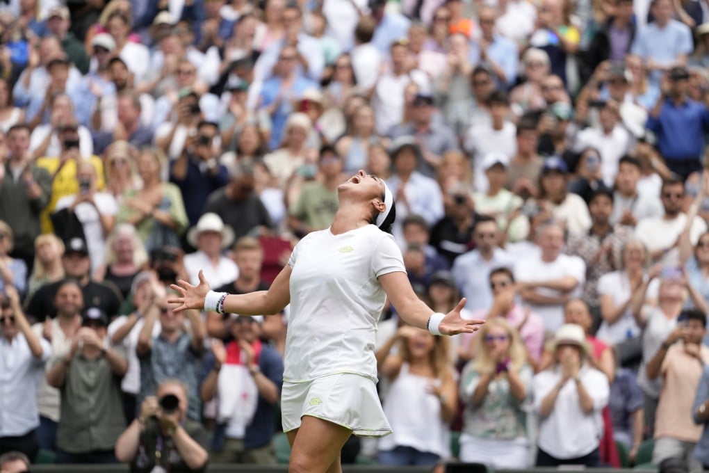 Tunisia’s Ons Jabeur celebrates after beating Kazakhstan’s Elena Rybakina in the women’s singles. Photo: AP