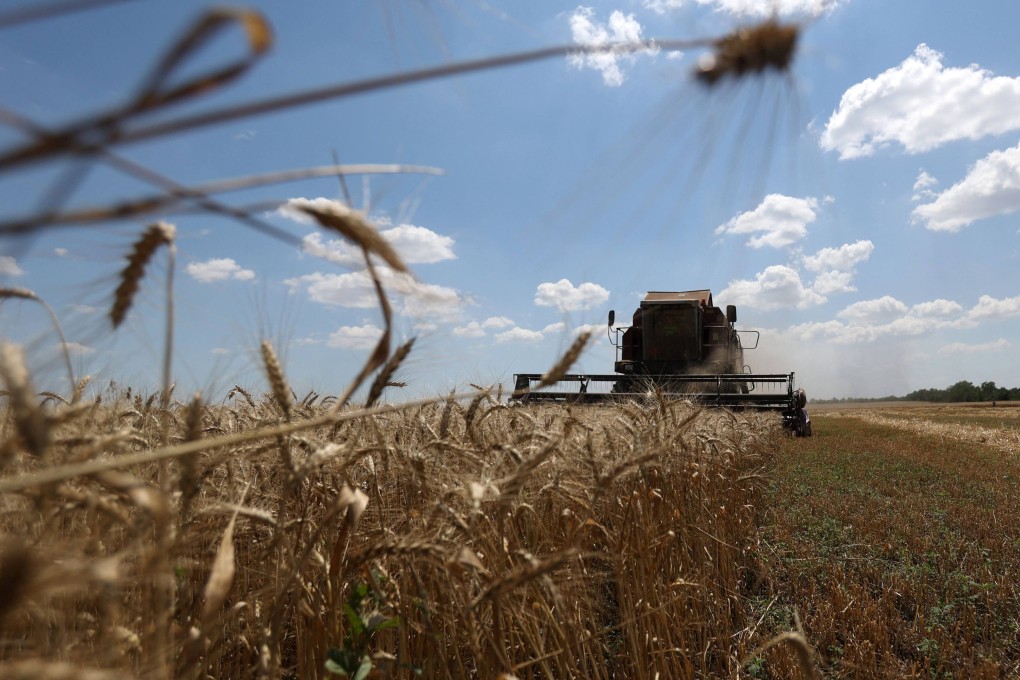 A combine harvests wheat near Novosofiivka village, in Ukraine’s Mykolaiv region on July 4. Photo: AFP