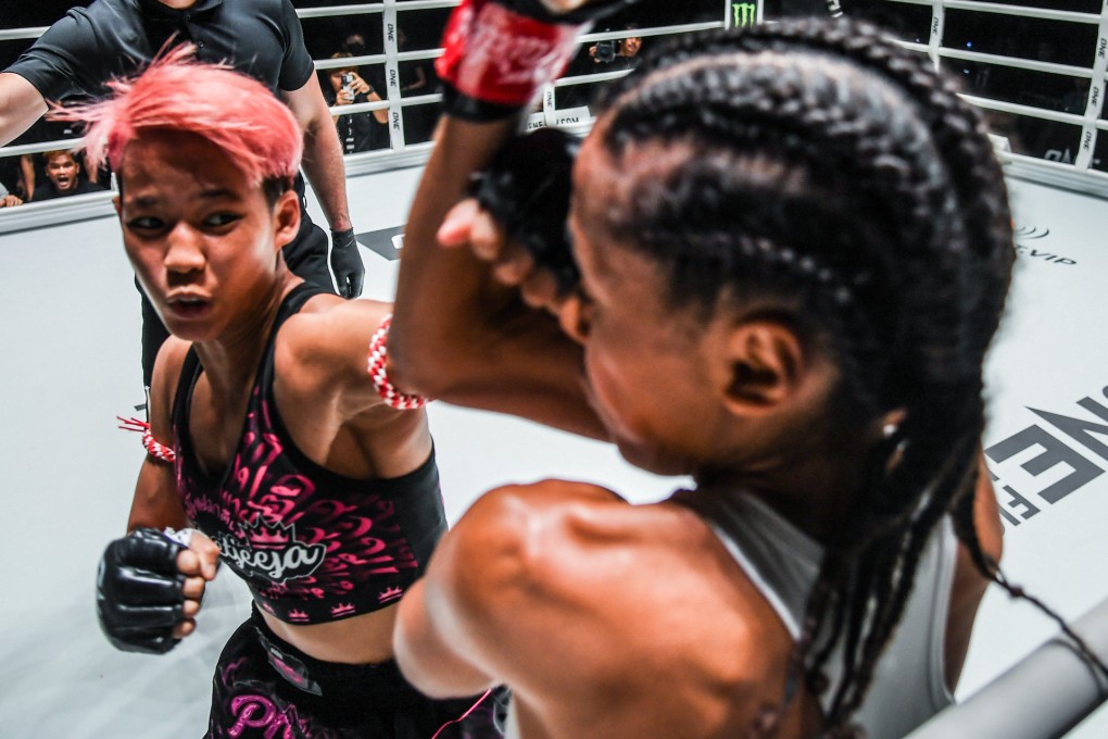 Phetjeeja throws a punch at Lara Fernandez at ONE Fight Night 12 in Bangkok. Photos: ONE Championship