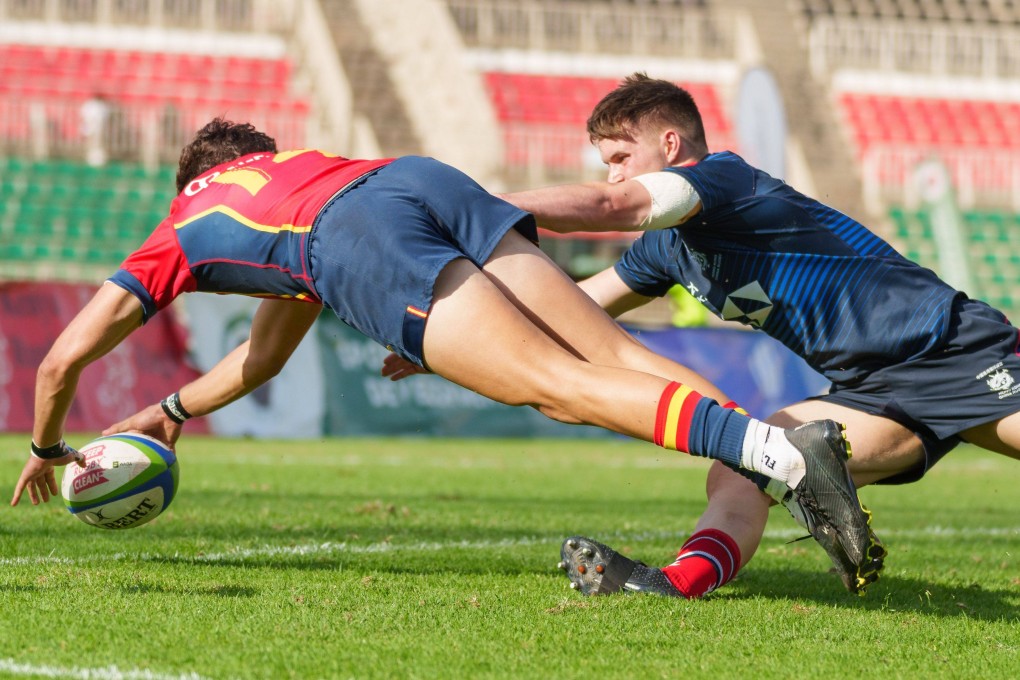 Spain wing Eloy de la Pisa Cuadrado scores one of his two tries against Hong Kong. Photo: World Rugby