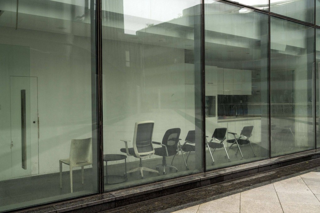 Office chairs are seen in an office building formerly known as the Evergrande Center in Shanghai on June 18, 2023. Photo: Bloomberg