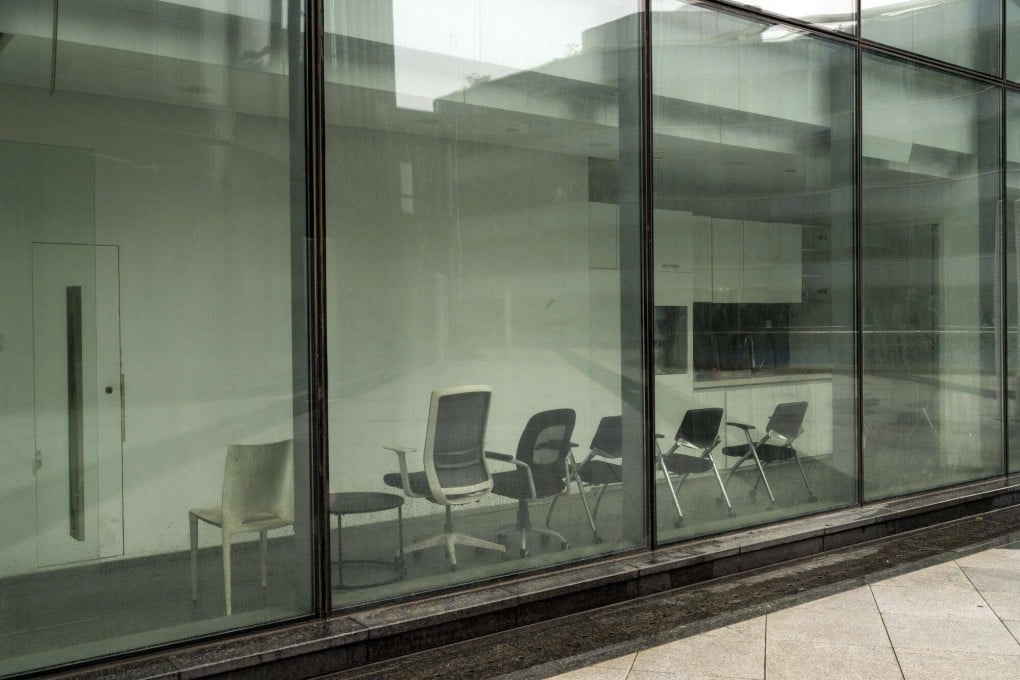 Office chairs are seen in an office building formerly known as the Evergrande Center in Shanghai on June 18, 2023. Photo: Bloomberg