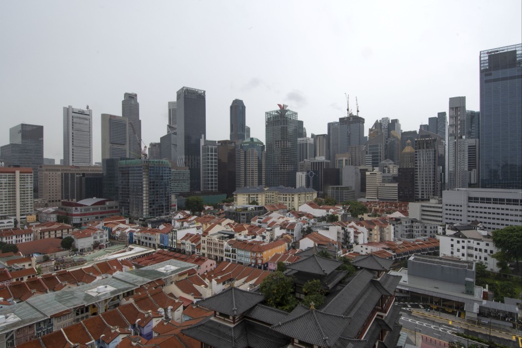 Home sales in Singapore weakened significantly in June. Photo: Xinhua