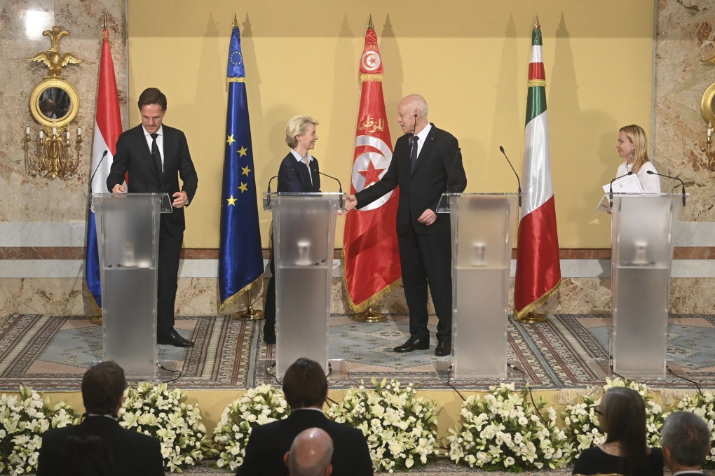 Tunisian President Kais Saied, centre right, shakes hands with European Commission President Ursula von der Leyen, centre left, during a press conference with Netherlands’ Prime Minister Mark Rutte, left and Italian Prime Minister Giorgia Meloni, at the presidential palace in Carthage, Tunisia on Sunday. Photo: Tunisian Presidency via AP