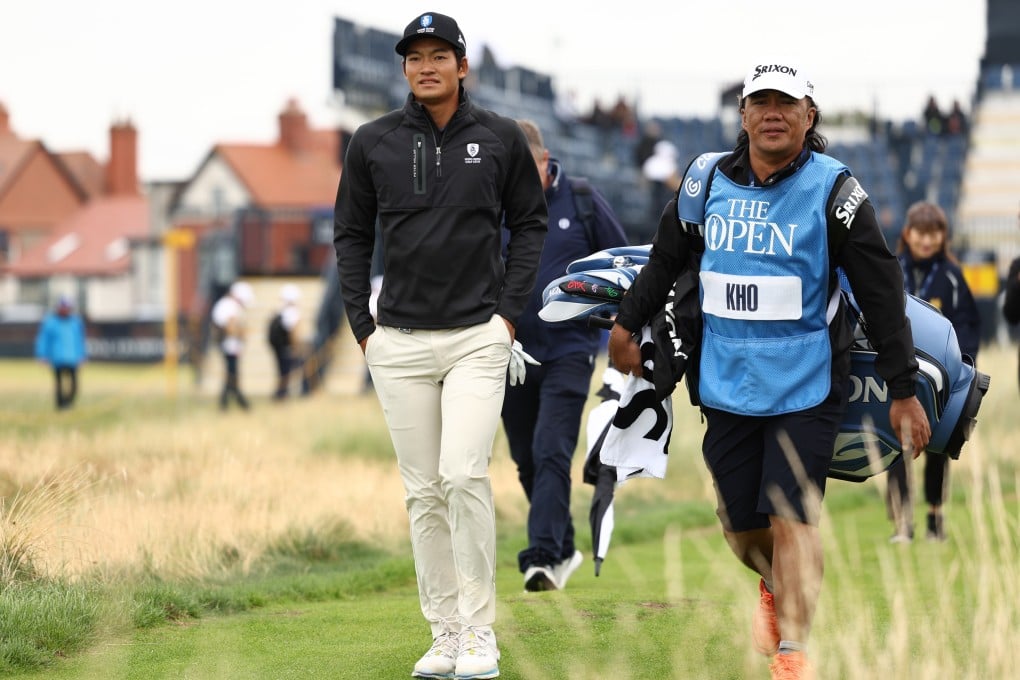 Taichi Kho and his caddie walk towards a fairway during a practice round at Royal Liverpool Golf Club. Photo: EPA-EFE