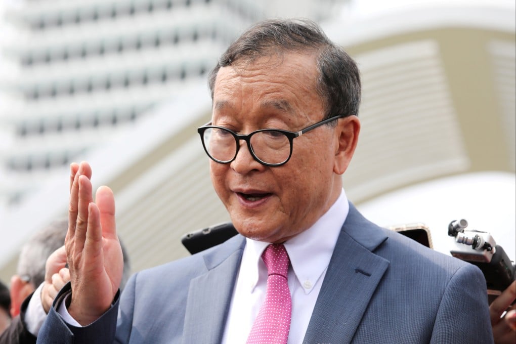 Cambodian opposition figurehead Sam Rainsy speaks to the media in Kuala Lumpur in 2019. He has lived in France since 2015 to avoid jail on a number of convictions he says are politically motivated. Photo: Reuters