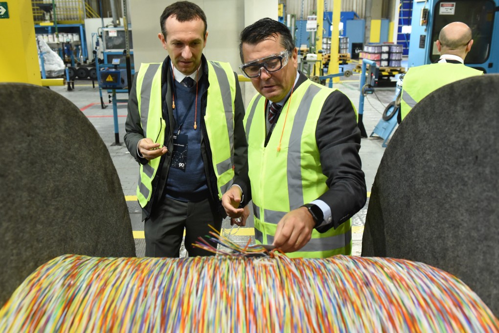 Marcelo Andrade (right), Prysmian’s vice-president for telecommunications in Latin America, inspecting optical cable at the company’s Brazilian facility. Photo: Prysmian Group