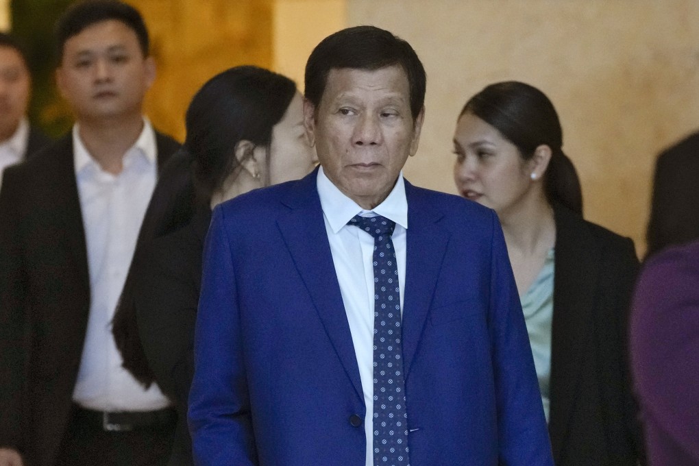 Former Philippine president Rodrigo Duterte leaves a hotel in Beijing on Monday. Photo: AP