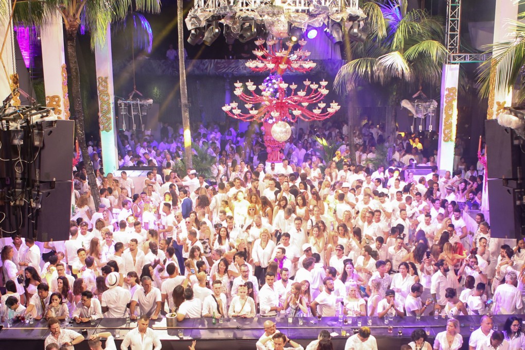 The annual White Party at Ku De Ta beach club in Bali takes cues from the global Dîner en Blanc events and Sean Combs’ New York take on the dressed-all-in-white dinner party.  Photo: Ku De Ta