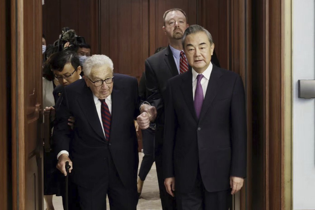 Former US secretary of state Henry Kissinger (left) meets Chinese State Councillor Wang Yi (right) in Beijing on Wednesday. Photo: AP