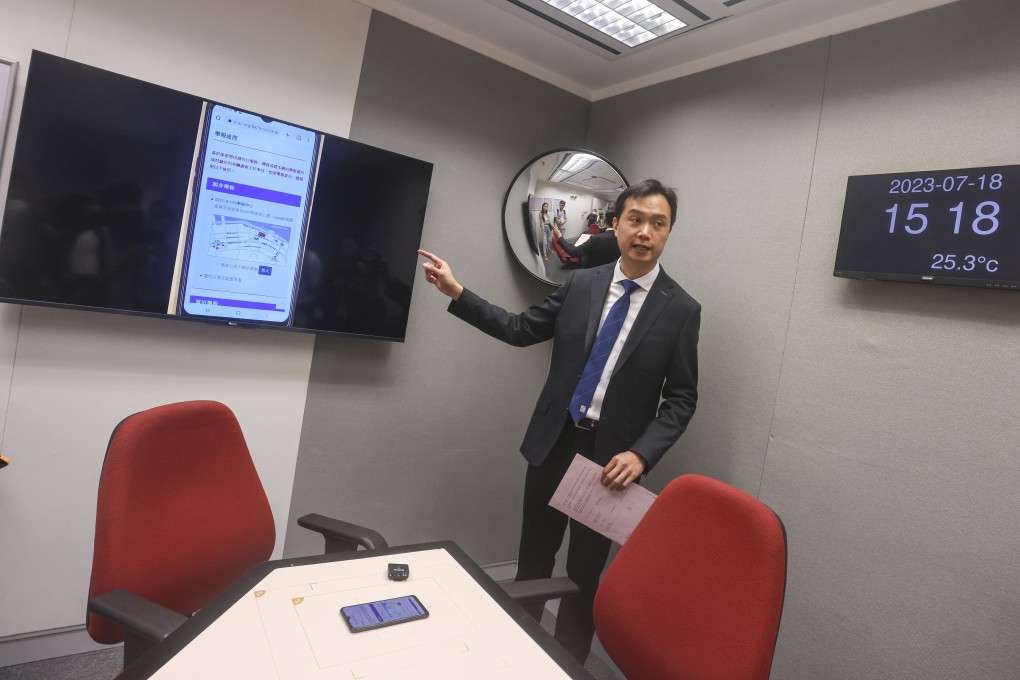 An ICAC official displays new-generation interview rooms, part of technologies covered in its UN workshops. Photo: Jonathan Wong