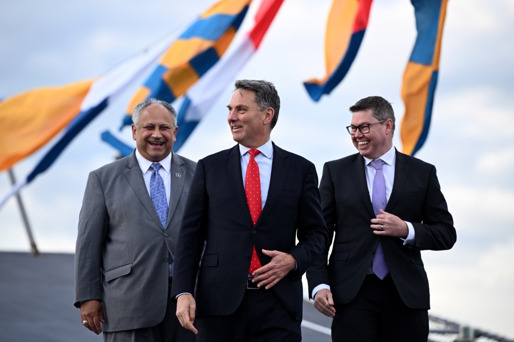 US Navy Secretary Carlos Del Toro, left, Australian Defence Minister Richard Marles and Australian Minister for Defence Industry Pat Conroy ahead of the opening ceremony for joint military exercise Talisman Sabre. Photo: EPA-EFE