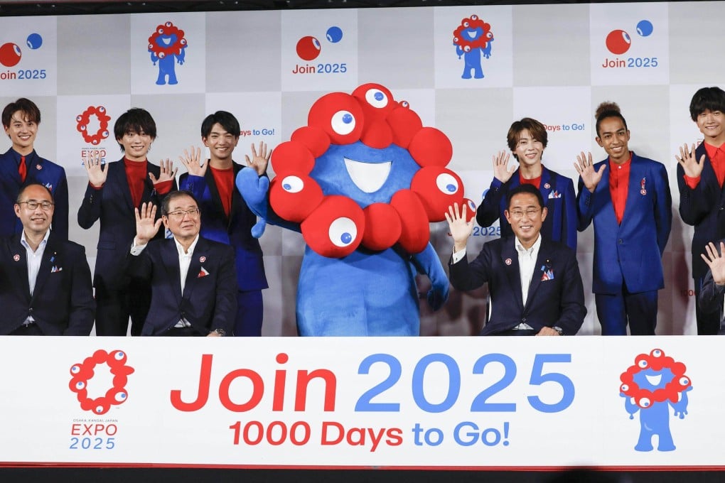 Japanese Prime Minister Fumio Kishida (first row, sitting third from left) during an event in Tokyo to promote the Osaka World Expo in July 2022. Photo: Kyodo
