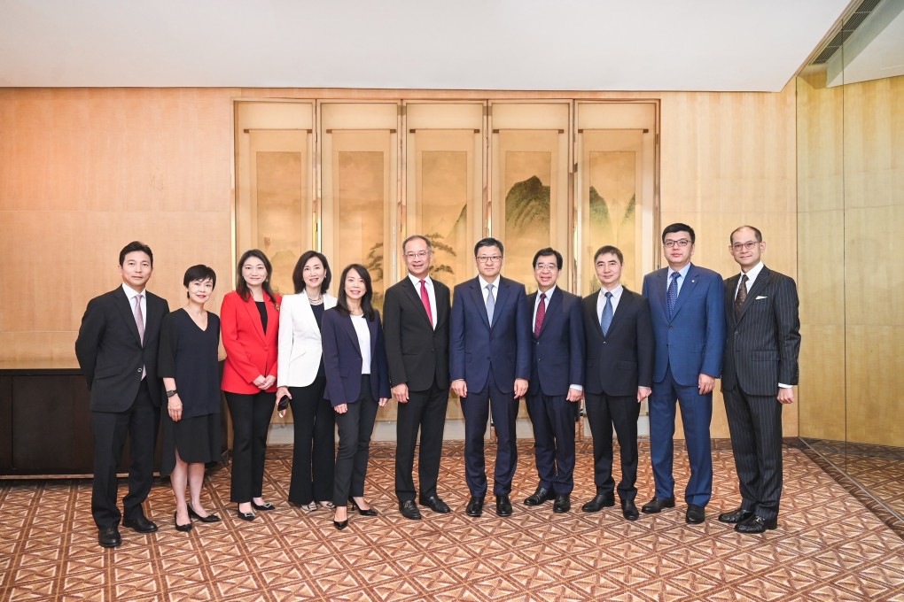 Eddie Yue, the HKMA’s CEO (sixth from left), and  Sun Yu, the Hong Kong Association of Banks’ chairman (seventh from left), during the visit to Beijing. Photo: Handout