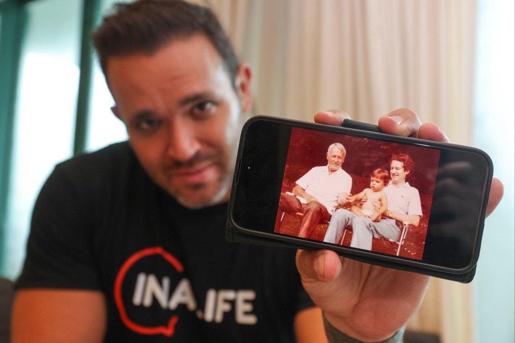 Nicholas Worley, CEO and founder of Inalife, shows an old family picture of (from left) his grandfather Cecil Norman Worley, himself (as a baby) and father Julian Ralph Worley. Photo: Edmond So