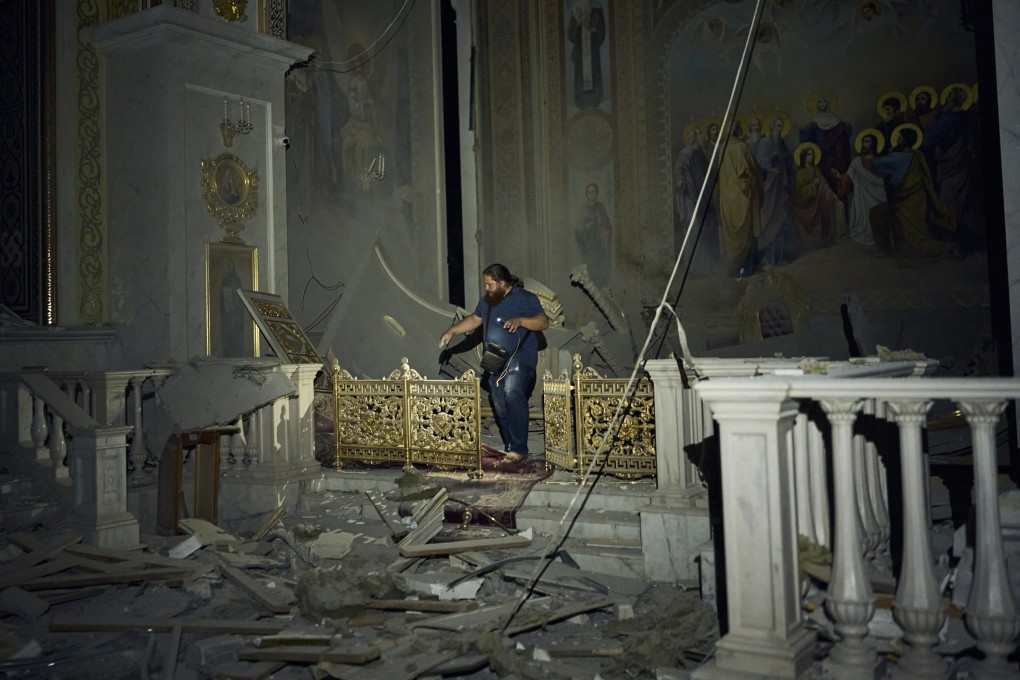 A man walks inside the Odesa Transfiguration Cathedral, damaged in a Russian missile attack in Odesa, Ukraine, on Sunday. Photo: AP