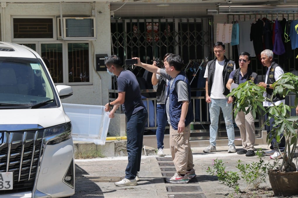 Hong Kong police gather evidence at a New Territories village house where the dismembered remains of model Abby Choi were discovered. Photo: Jelly Tse
