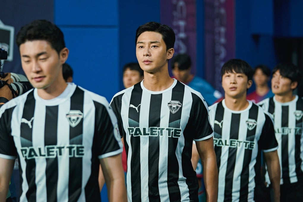 Park Seo-joon (centre) in a still from “Dream”, a Netflix movie that adapts the story of South Korea’s participation in the Homeless World Cup soccer games.