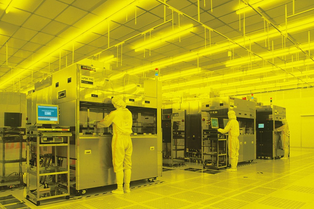 Workers inside the clean room at a Hua Hong Semiconductor wafer fab. Photo: Handout
