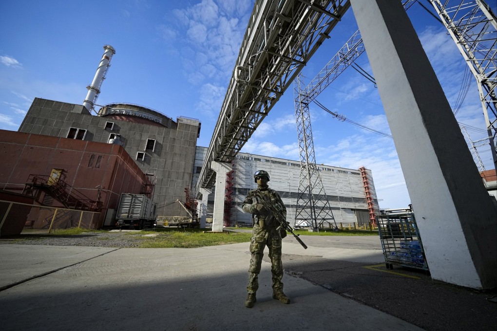 A Russian serviceman guards an area of the Zaporizhzhia nuclear power station in territory under Russian military control. Photo: AP