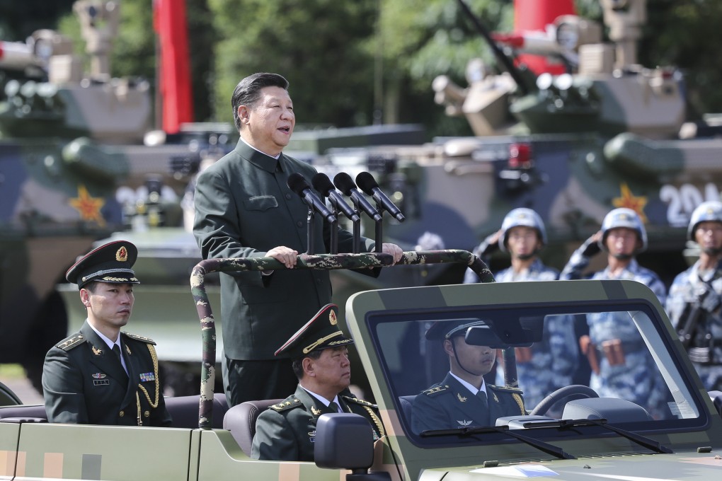 Wang Shaojun, pictured in the front passenger seat, accompanied Xi Jinping on a visit to Hong Kong in 2017. Photo: Sam Tsang