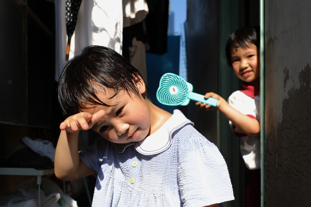 A child in Tai Kok Tsui sweats in Hong Kong’s heatwave in May 2018 when temperatures went above 35 degrees Celsius. Last year, the hottest day saw the mercury hit 36.1 degrees. And this year has a “high chance” of being among the city’s top 10 hottest on record, said the Observatory. Photo: Sam Tsang