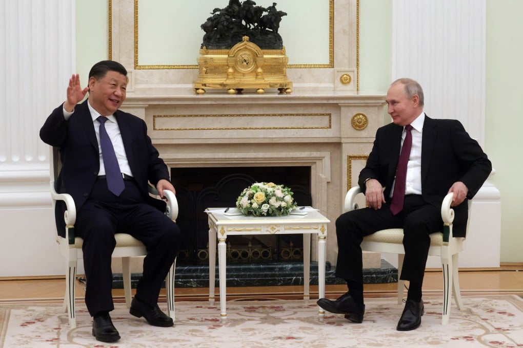Chinese President Xi Jinping speaks to Russian President Vladimir Putin at the Kremlin in Moscow on March 20. Photo: AP