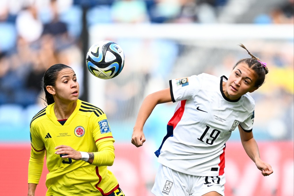 Casey Phair of South Korea (right) challenges Colombia’s Lorena Bedoya Durango during the group match in Sydney. Photo: EPA-EFE