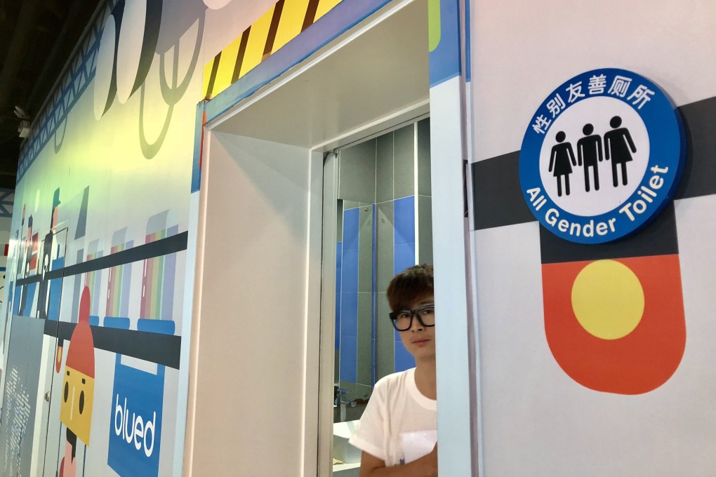An employee exits a unisex toilet at the Beijing headquarters of Blued, the world’s largest gay social network app, on May 29, 2018. Photo: Xinyan Yu
