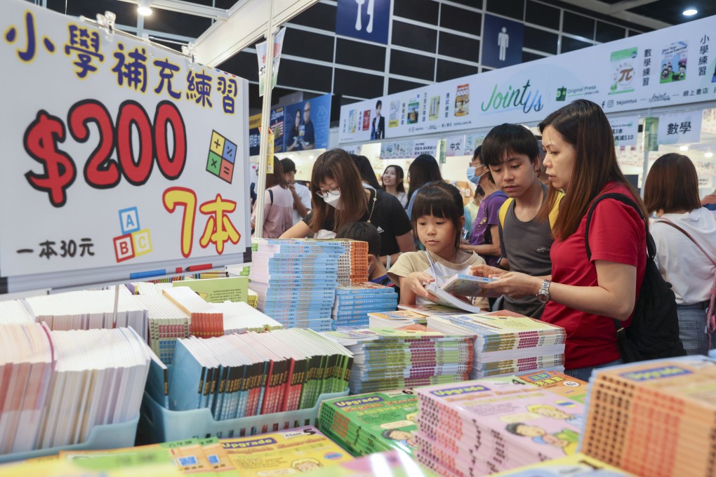 Attendees hunt for bargains on the final day of the Hong Kong Book Fair on Tuesday. Photo: Yik Yeung-man