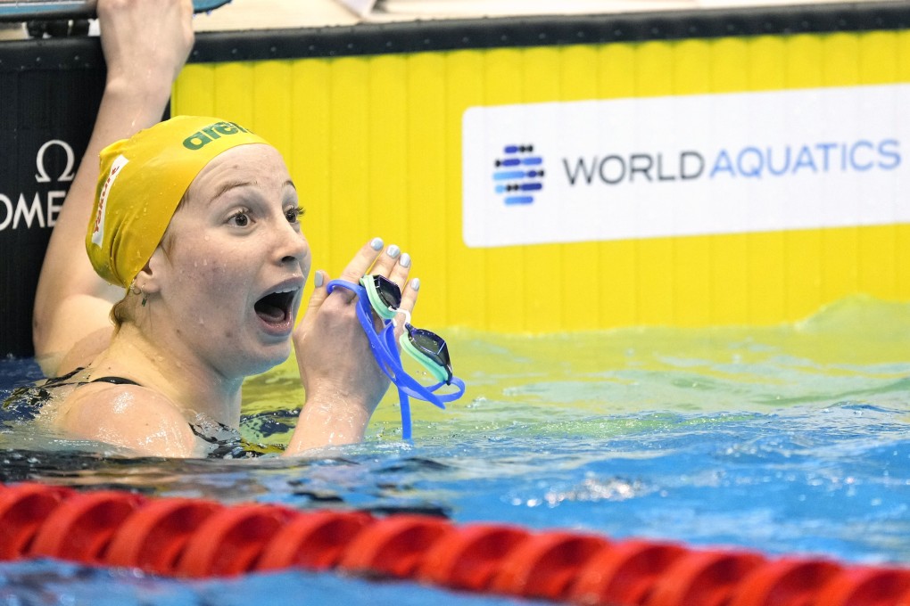 Mollie O’Callaghan of Australia realises she has set a new world record in winning the 200m freestyle in Fukuoka. Photo: EPA-EFE