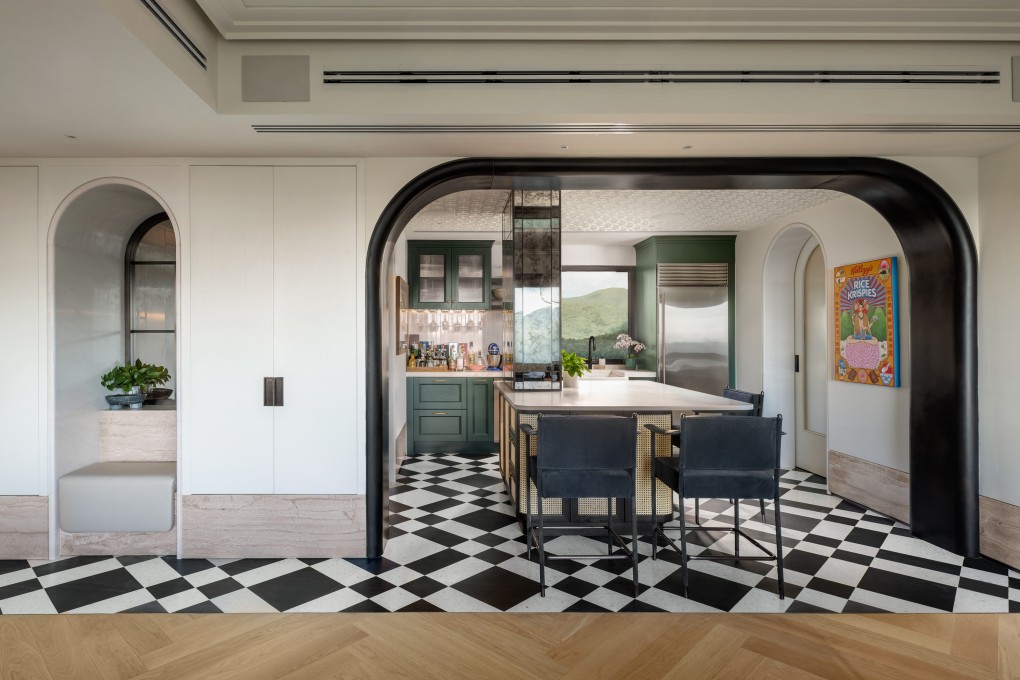 East meets West in this apartment at Parkview on Hong Kong Island, a marriage of colonial and mid-century modern design, vintage dining chairs and Internet of Things technology. Photo: Steven Ko
