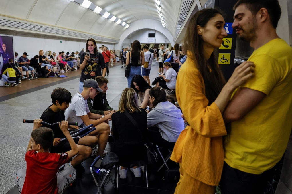 People take cover inside a subway station during an air raid alert in Kyiv on Wednesday. Photo: Reuters