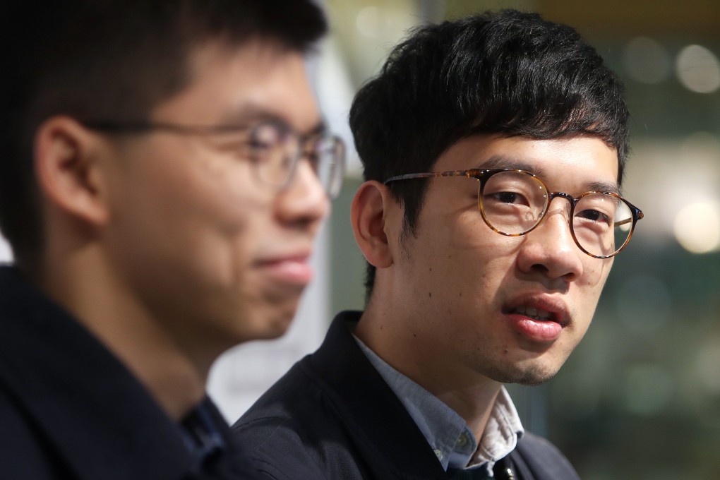 Former lawmaker Nathan Law (right) is now based in the UK and among eight on a wanted list by national security police. Photo: Winson Wong