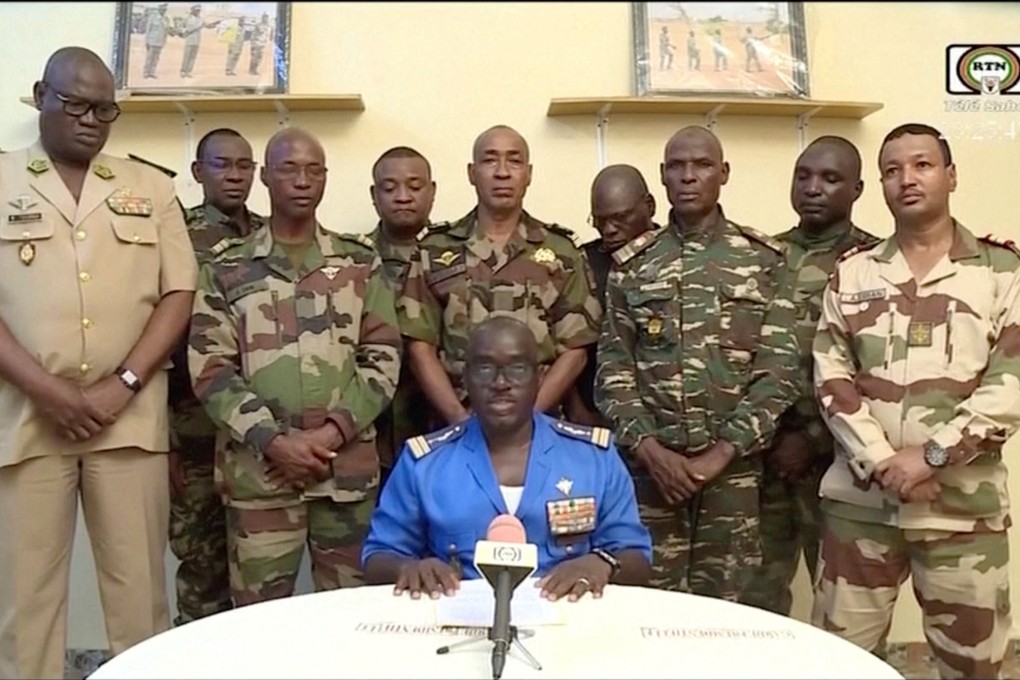 Niger Army spokesman Colonel-Major Amadou Adramane speaks during an appearance on national television in Niamey on Wednesday. Photo: ORTN via Reuters