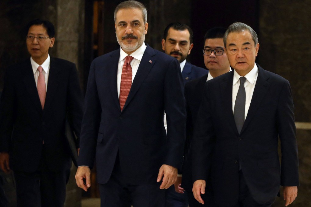 Turkish Foreign Minister Hakan Fidan (left) with China’s top diplomat, Wang Yi, in Ankara on Wednesday. Photo: AFP