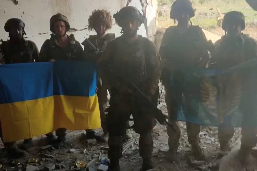 Ukrainian soldiers say they have recaptured the Ukrainian village of Staromaiorske, in a video released on Thursday. Photo: Telegram via @V_Zelenskiy_official/Reuters