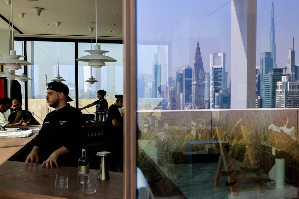 Solemann Haddad, head chef at Moonrise Middle Eastern-Japanese fusion restaurant, with Dubai’s skyline in the background. Now with its owon Michelin Guide, the emirate has ambitions to become a global dining destination. Photo: AFP