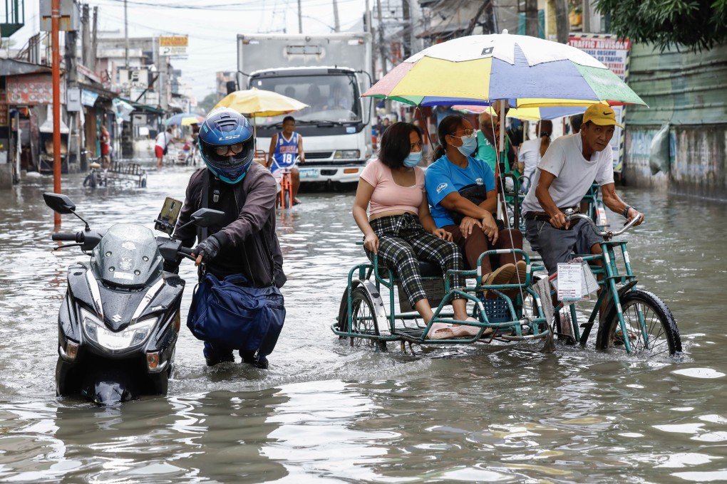 A flooded road in Valenzuela City in Metro Manila, on 27 July 2023 after typhoon Doksuri brought torrential rain. Photo: EPA-EFE
