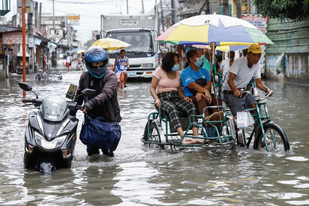 A flooded road in Valenzuela City in Metro Manila, on 27 July 2023 after typhoon Doksuri brought torrential rain. Photo: EPA-EFE