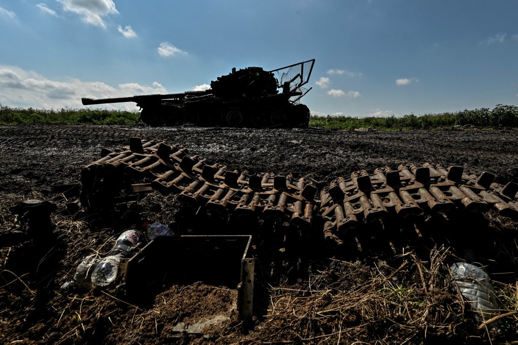 A destroyed Russian tank is seen in the recently liberated Ukrainian village of Novodarivka on July 21. Photo: Reuters