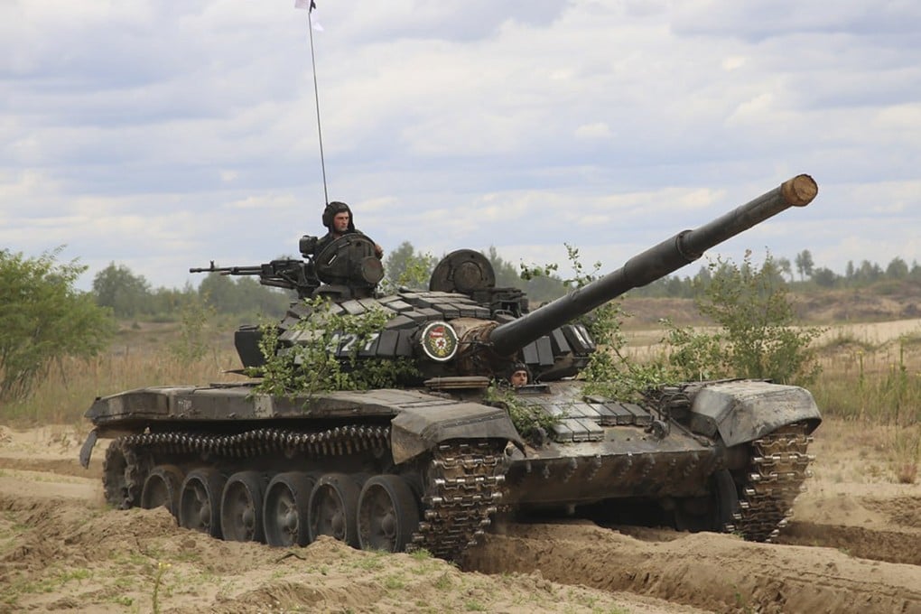 A Belarusian tank during manoeuvres with Wagner mercenary fighters near the border with Poland. Photo: AP