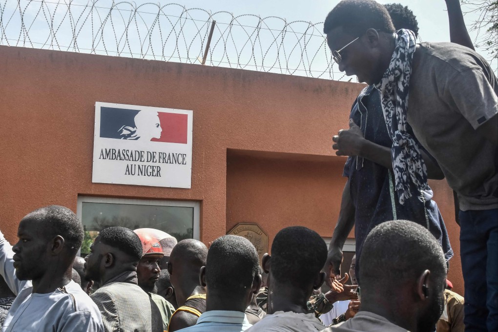 Protesters gather in front of the French embassy in Niamey during a demonstration that followed a rally in support of Niger’s junta. Photo: AFP