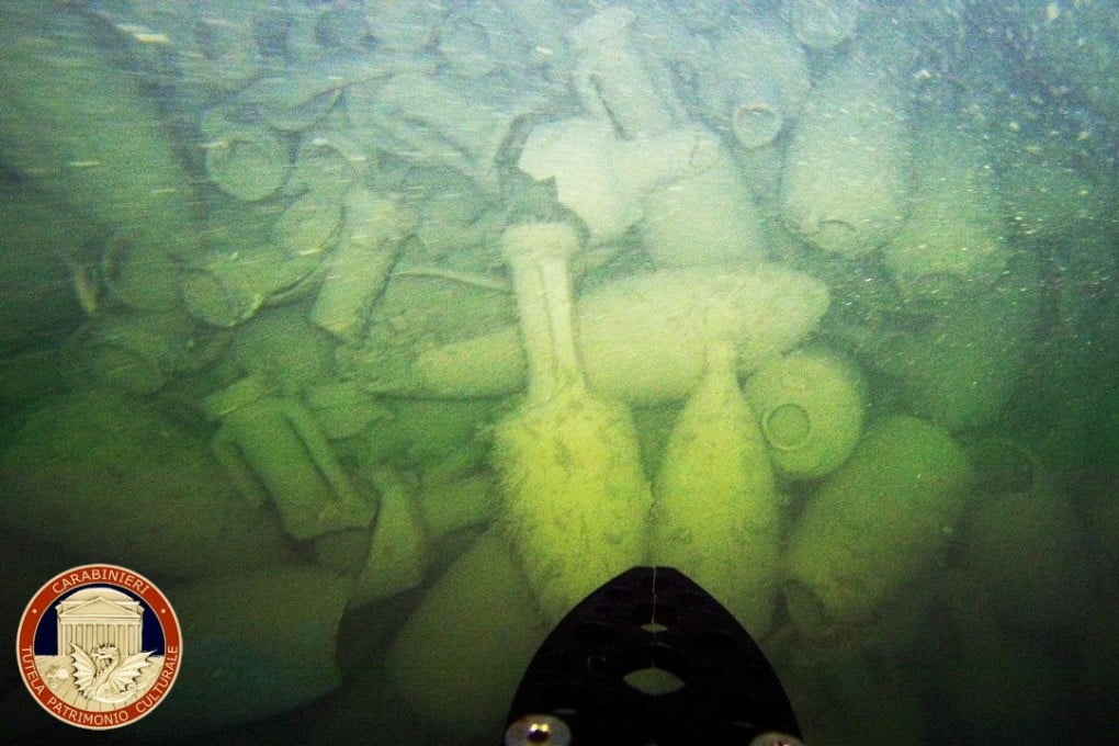 Amphorae found by Carabinieri Command for the Protection of Cultural Heritage in a wreck of an ancient Roman cargo ship at the bottom of the sea in Civitavecchia, near Rome, Italy. Photo: Carabinieri / Handout via Reuters